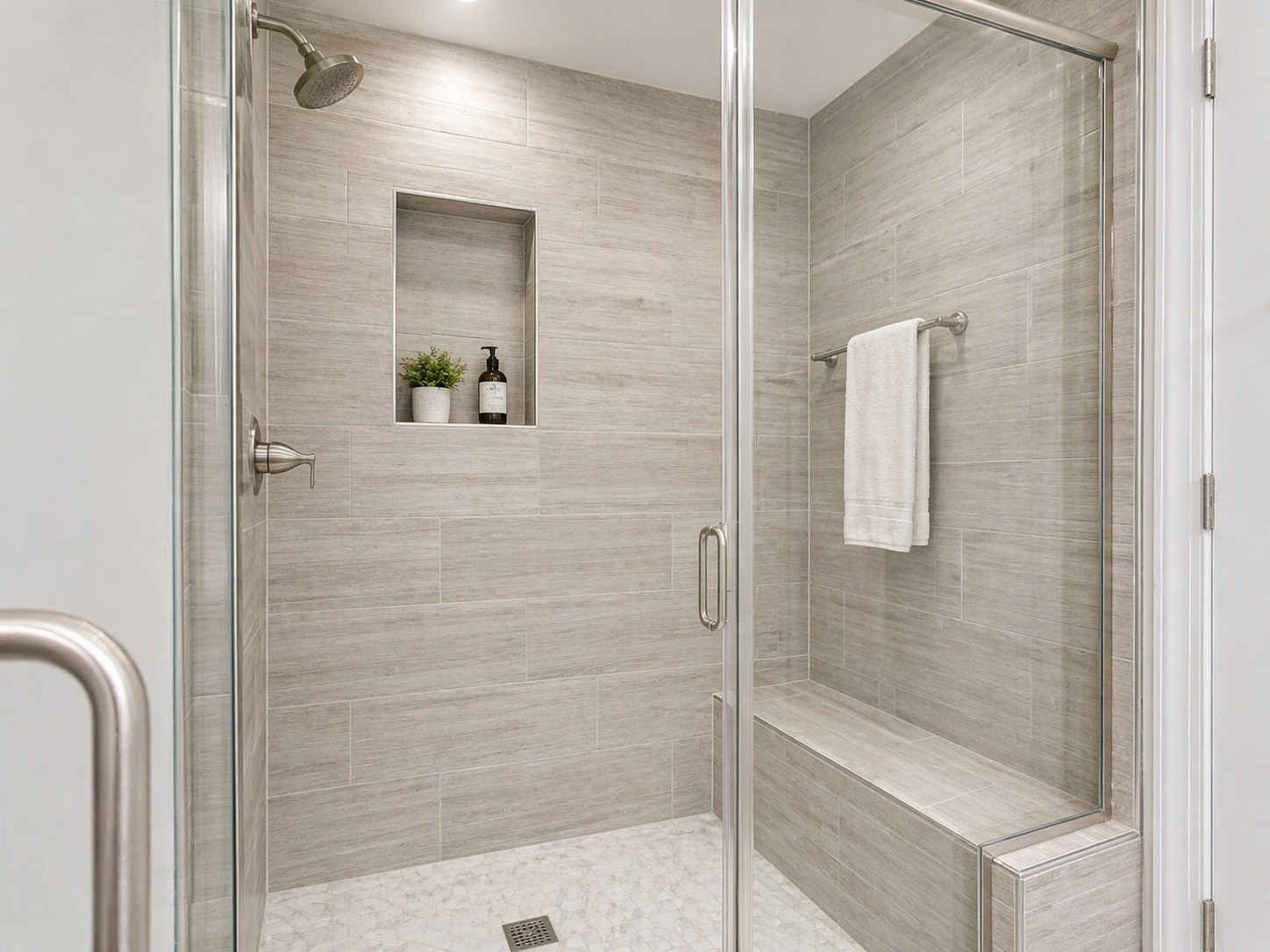 Modern tile shower installation with clean grout lines